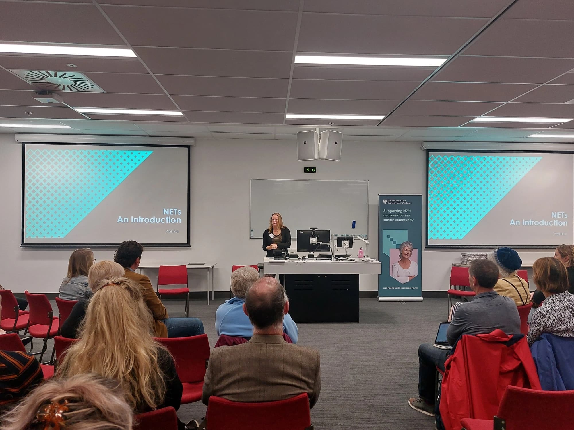 People learning about neuroendocrine cancer together at a NECNZ Patient Education Day
